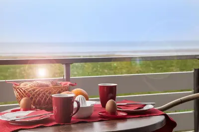 Ein Balkon oder eine Terrasse in der Unterkunft Dünenglück, Ferienwohnung 24