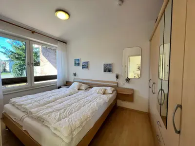 Ein Bett oder Betten in einem Zimmer der Unterkunft Am Grooten Steen 1, Ferienwohnung 5