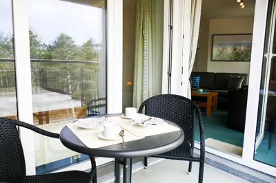 Ein Balkon oder eine Terrasse in der Unterkunft Haus Nordseebrandung NB43