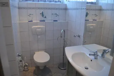 Ein Badezimmer in der Unterkunft Hus Willem Wohnung I 19