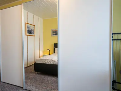 Ein Bett oder Betten in einem Zimmer der Unterkunft Hus Willem Wohnung I 20