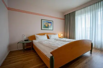 Ein Bett oder Betten in einem Zimmer der Unterkunft Hus Willem Wohnung II 12