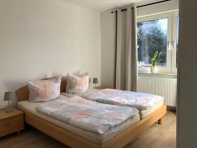 Ein Bett oder Betten in einem Zimmer der Unterkunft Lotus 4