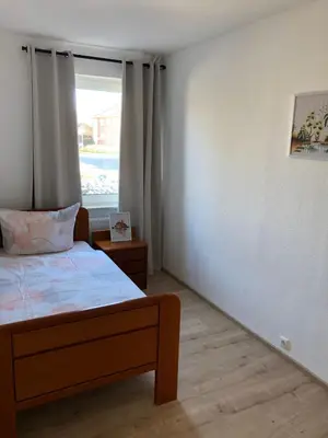 Ein Bett oder Betten in einem Zimmer der Unterkunft Lotus 4