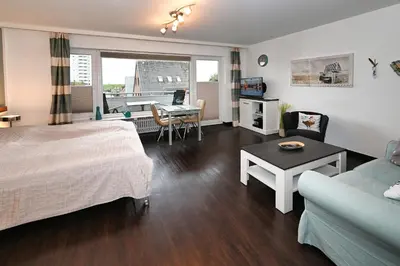 Ein Bett oder Betten in einem Zimmer der Unterkunft Büsumer Möv