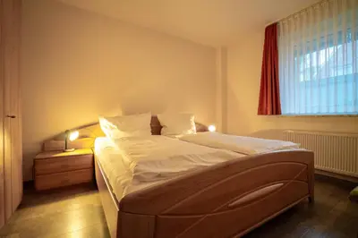 Ein Bett oder Betten in einem Zimmer der Unterkunft Bohne