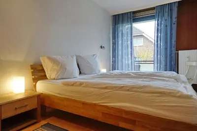 Ein Bett oder Betten in einem Zimmer der Unterkunft Viktoriastraße 5 D Thomsen 806