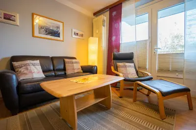 Ein Sitzbereich in der Unterkunft Hus Willem Wohnung I 12