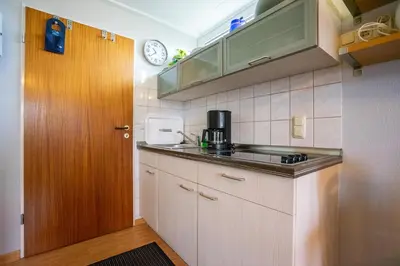 Küche/Küchenzeile in der Unterkunft Hus Willem Wohnung I 12