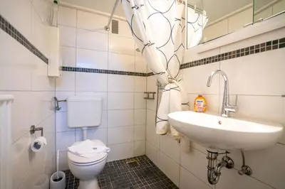 Ein Badezimmer in der Unterkunft Hus Willem Wohnung I 12