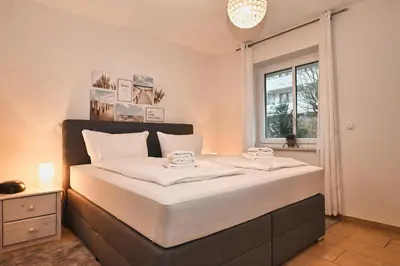 Ein Bett oder Betten in einem Zimmer der Unterkunft Seehafen 0 3