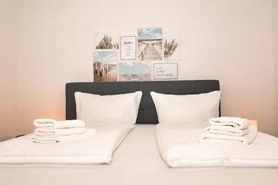 Ein Bett oder Betten in einem Zimmer der Unterkunft Seehafen 0 3