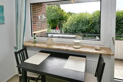 Ein Balkon oder eine Terrasse in der Unterkunft Büsumer Kurparkblick