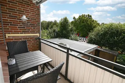 Ein Balkon oder eine Terrasse in der Unterkunft Büsumer Kurparkblick
