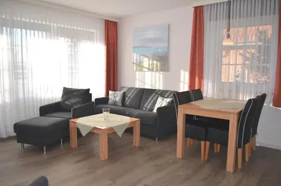 Ein Sitzbereich in der Unterkunft Strandmuschel