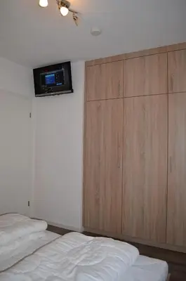 Ein Bett oder Betten in einem Zimmer der Unterkunft Strandmuschel