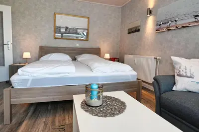 Ein Bett oder Betten in einem Zimmer der Unterkunft Nordseemomente