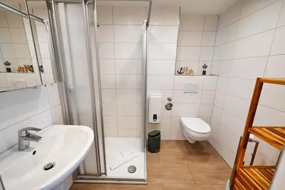 Ein Badezimmer in der Unterkunft Hus Willem Wohnung I 16, Strandläufer