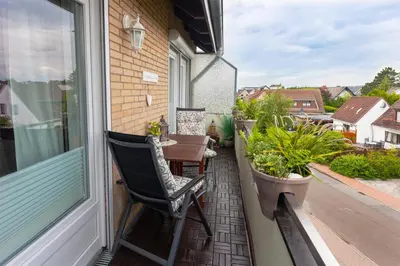 Ein Balkon oder eine Terrasse in der Unterkunft Hus Willem Wohnung II 18, Muschelstübchen mit Strandkorb