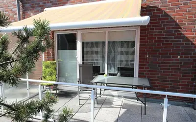 Ein Balkon oder eine Terrasse in der Unterkunft Seemeile 2 18 Seestern