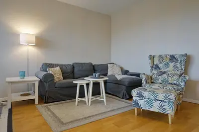 Ein Sitzbereich in der Unterkunft Büsumer Hochhaus Wohnung In Lee