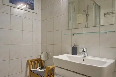 Ein Badezimmer in der Unterkunft Büsumer Hochhaus Wohnung In Lee