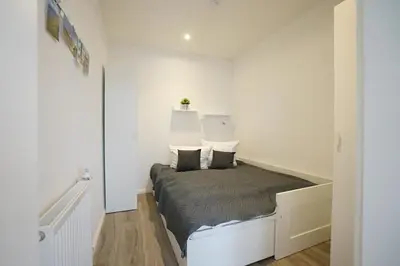 Ein Bett oder Betten in einem Zimmer der Unterkunft Deich