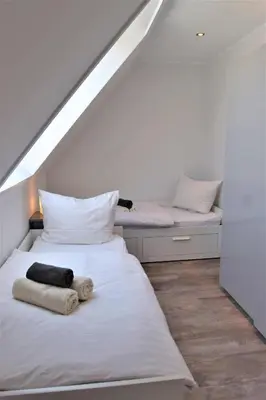 Ein Bett oder Betten in einem Zimmer der Unterkunft Witte Bank