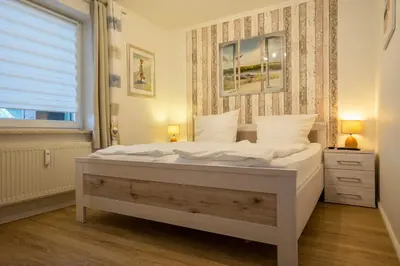 Ein Bett oder Betten in einem Zimmer der Unterkunft Seemeile 2 9
