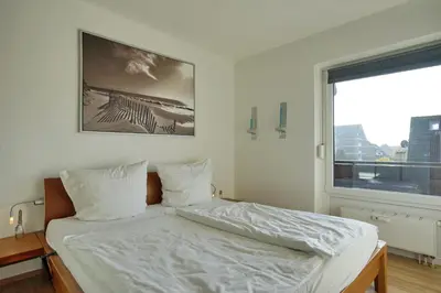 Ein Bett oder Betten in einem Zimmer der Unterkunft Petersen