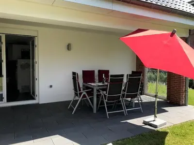 Ein Patio oder anderer Außenbereich in der Unterkunft Haus zwischen den Deichen Wohnung 1