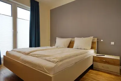 Ein Bett oder Betten in einem Zimmer der Unterkunft Helios