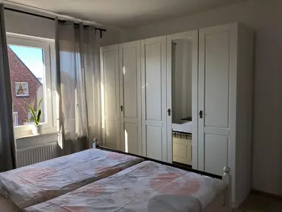 Ein Bett oder Betten in einem Zimmer der Unterkunft Lotus 5