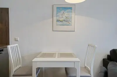 Ein Sitzbereich in der Unterkunft Schloss am Meer Wohnung 31