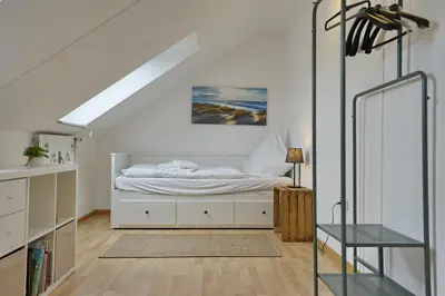 Ein Bett oder Betten in einem Zimmer der Unterkunft Möwennest