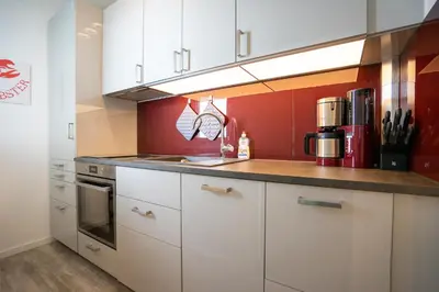 Küche/Küchenzeile in der Unterkunft Büsumer Hochhaus Büsumer Möwenblick
