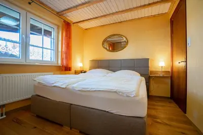 Ein Bett oder Betten in einem Zimmer der Unterkunft Godewind Haus Wattwurm