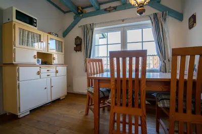 Küche/Küchenzeile in der Unterkunft Klaar Kimming Haus Wattwurm