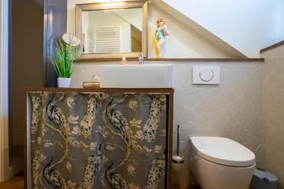 Ein Badezimmer in der Unterkunft Hohenzollernpassage Wohnung Nordseeidyll