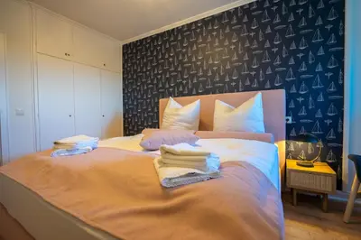 Ein Bett oder Betten in einem Zimmer der Unterkunft Südgatt