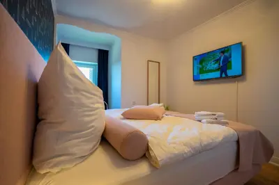 Ein Bett oder Betten in einem Zimmer der Unterkunft Südgatt
