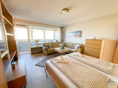 Ein Bett oder Betten in einem Zimmer der Unterkunft Haus Alte Liebe Whg 404 Utkiek