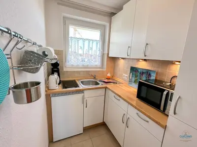 Küche/Küchenzeile in der Unterkunft Haus Alte Liebe Whg 404 Utkiek