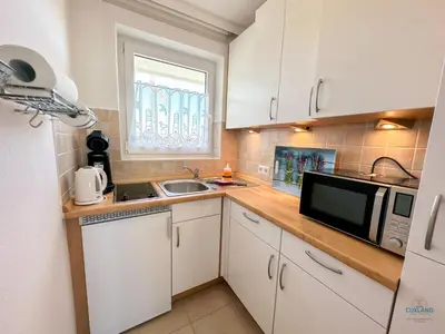 Küche/Küchenzeile in der Unterkunft Haus Alte Liebe Whg 404 Utkiek