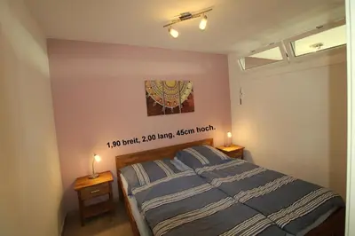 Ein Bett oder Betten in einem Zimmer der Unterkunft Panorama Whg 81, 5 OG