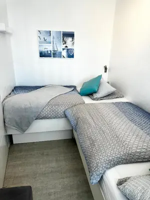Ein Bett oder Betten in einem Zimmer der Unterkunft Panorama Whg 40, 2 OG