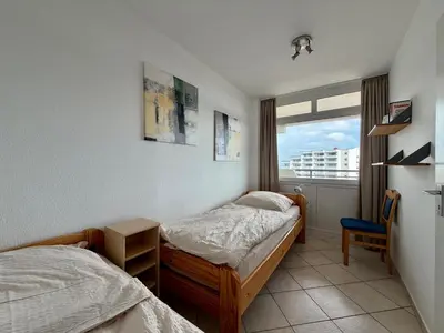 Ein Bett oder Betten in einem Zimmer der Unterkunft Panorama Whg 80, 5 OG