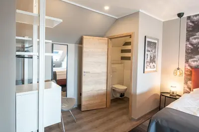 Ein Bett oder Betten in einem Zimmer der Unterkunft Encore Seaside