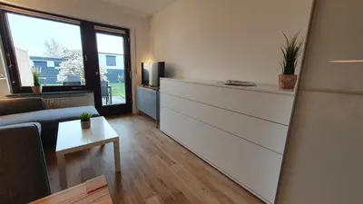 Ein Sitzbereich in der Unterkunft Ferienwohnung Meerverliebt