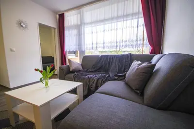 Ein Sitzbereich in der Unterkunft Apartmenthaus Frauenpreiss FeWo 111
